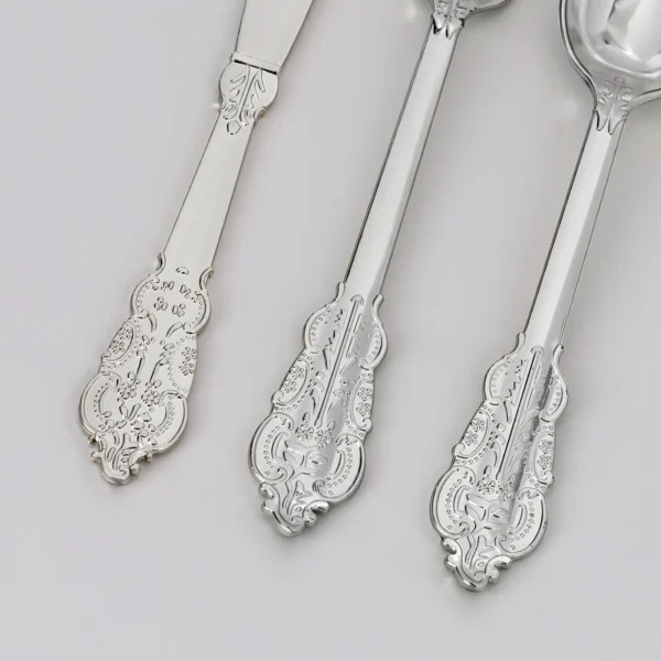 metallic silver plastic cutlery