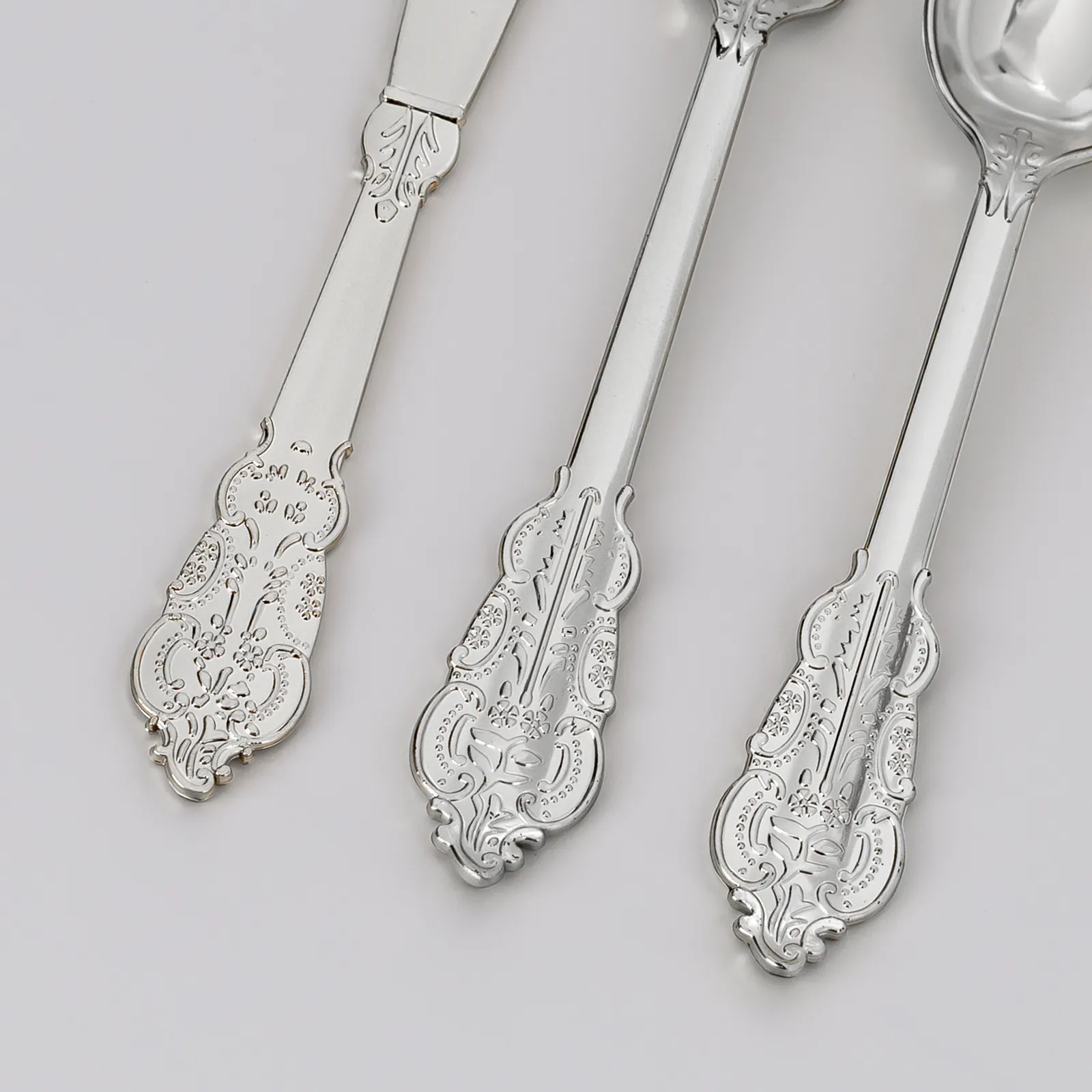 metallic silver plastic cutlery